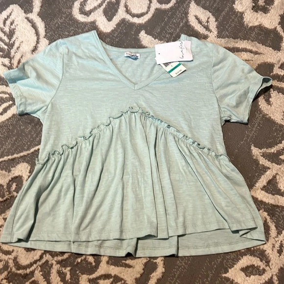 Love fire top. Short sleeves. New. Size large. Mint green. Soft. Stretchy. - Picture 1 of 4